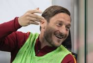 MILAN, ITALY - MAY 07: Francesco Totti of AS Roma gestures before the Serie A match between AC Milan and AS Roma at Stadio Giuseppe Meazza on May 7, 2017 in Milan, Italy. (Photo by Marco Luzzani/Getty Images)